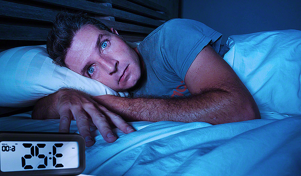 Restless Worried Young Attractive Man Awake At Night Lying On Bed Sleepless With Eyes Wide 